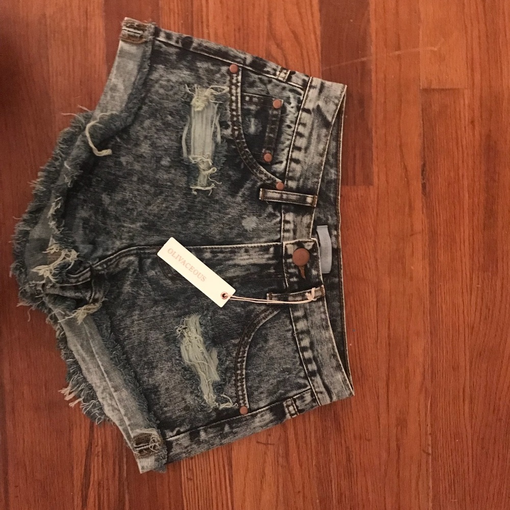 New with tags distressed acid washed cut offs